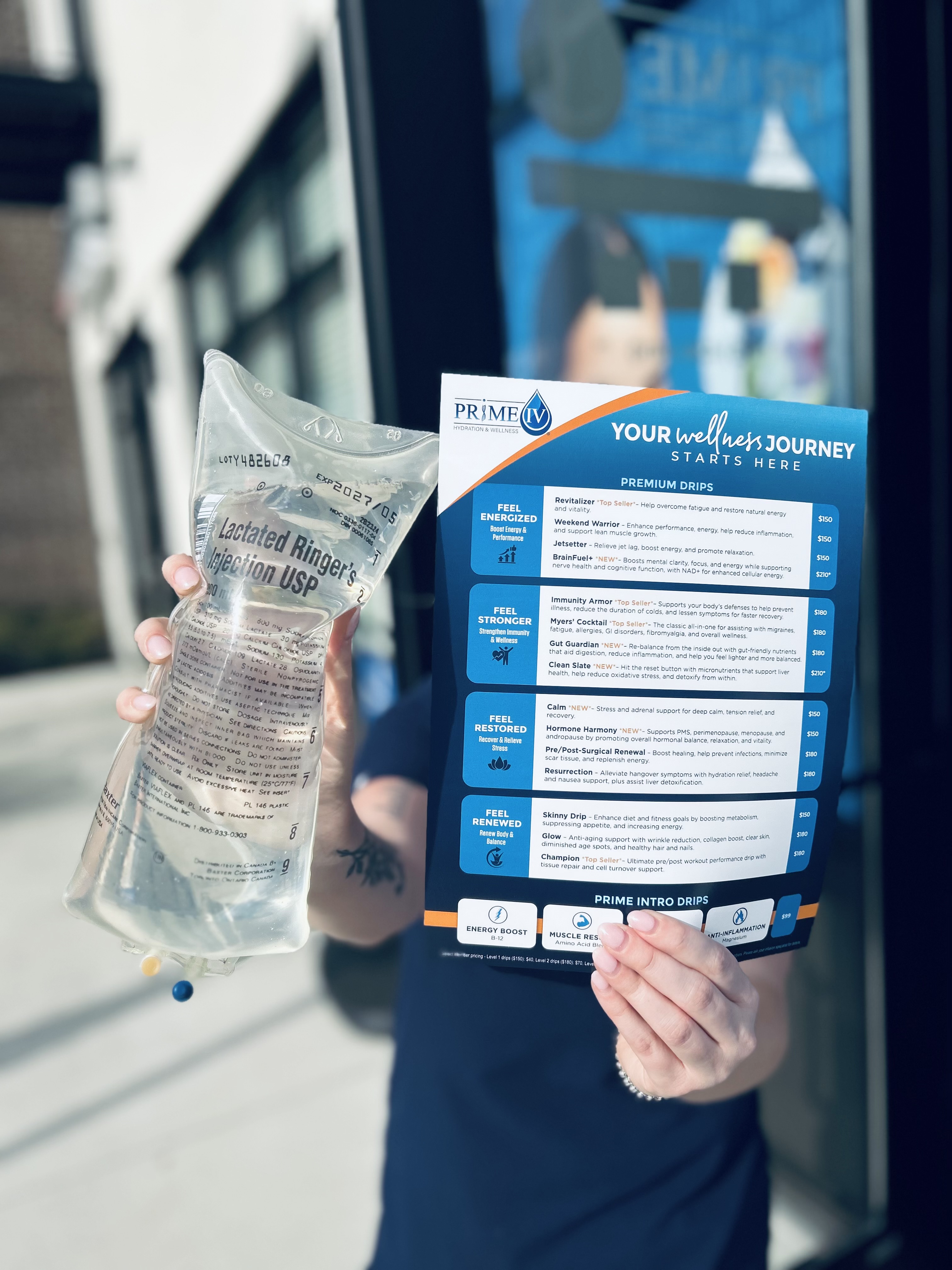 The Prime IV wellness journey menu card alongside an IV hydration bag